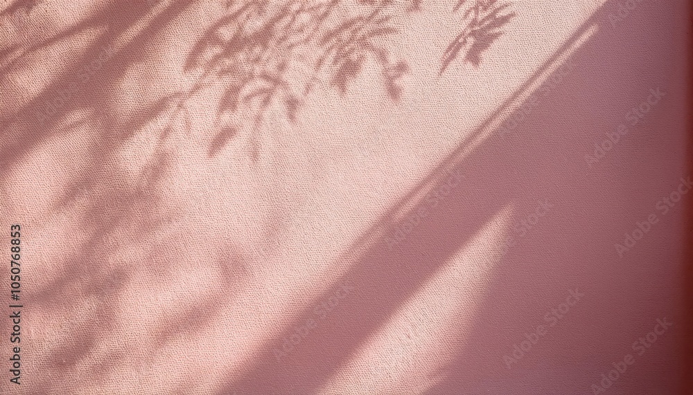 Poster soft pink textured wall with dramatic shadow play from sunlight filtering through leaves. ideal for 