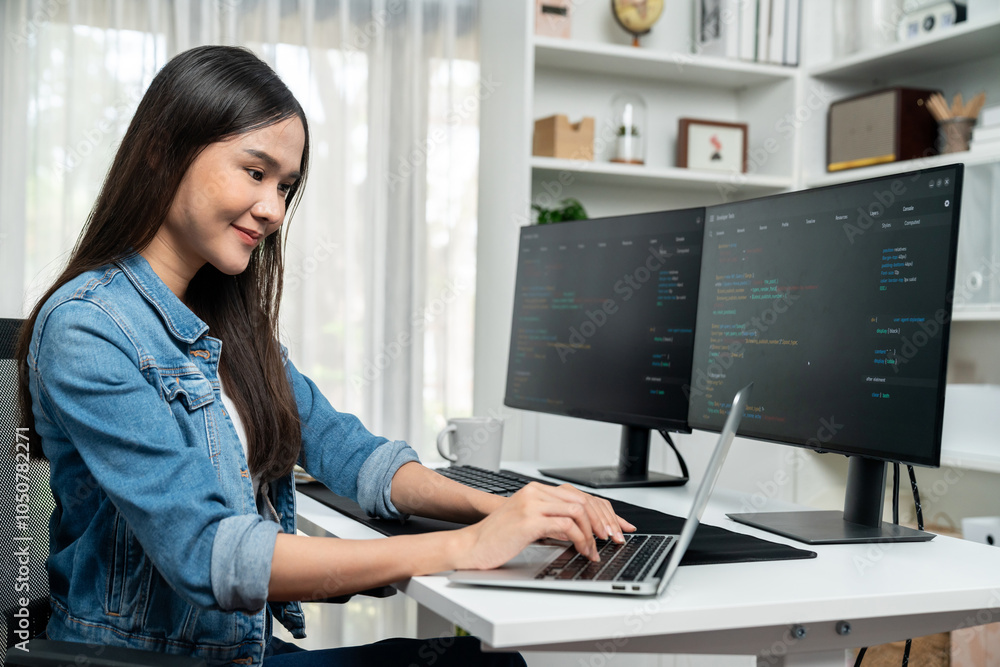Poster smiling young asian in it developer creating with typing online information on laptop with coding pr