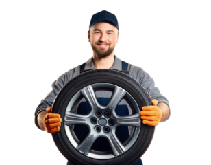 Smiling mechanic holding car wheel on transparent background