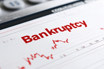 Close-up of a financial statement showing bankruptcy trends