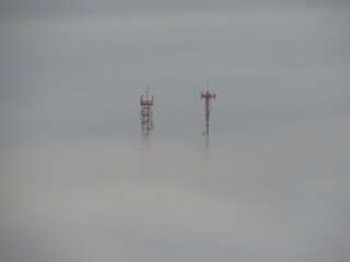 Telephone tower above the clouds at the top of Serra de Caldas, Goiás Brazil (Torre de telefonia...