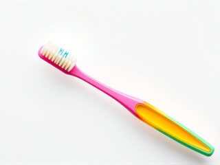 A vibrant toothbrush featuring a yellow handle, showcasing a blend of colors on its bristles.