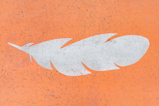 Closeup view of part of an indigenous themed crosswalk.