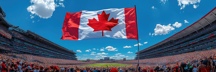 A vibrant Canadian flag flies high in a packed stadium under clear blue skies as fans cheer for their team during an exhilarating match