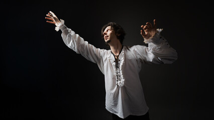 The dramatic hero calls out to the gods in the pose of a praying man, the style of classical...