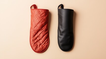 Red and black leather mittens displayed on a light background, each with a quilted pattern, blending style and function for everyday household use.