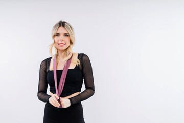 Obraz premium Photo of woman workout with resistance band. Strength and motivation.
