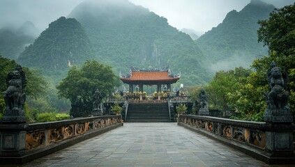 Obraz premium Ancient Temple Pathway in Lush Green Mountains