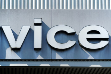 vice sign letter on the wall