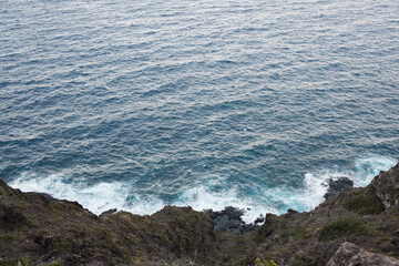 waves crashing on rocks