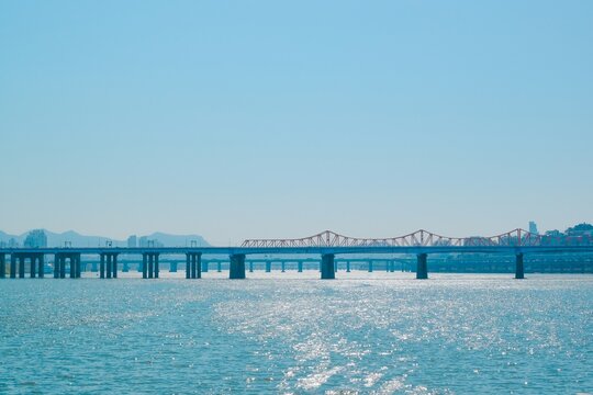 massive concrete bridge over ocean water