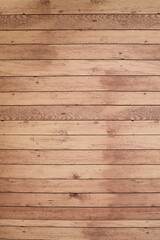 Naklejka premium Textured wooden background highlighting all the smallest details of wood material and its beauty, vertical photo