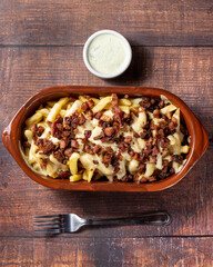 fries with bacon and cheese topping