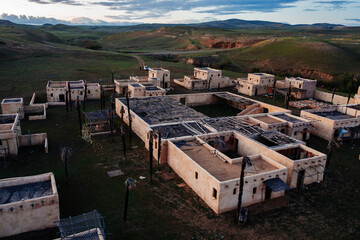 Tbilisi district, Georgia, Oriental village. Houses with straw roofs. Film decoration