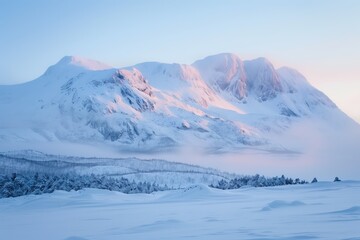 Expansive snowy landscape with soft light illuminating gentle mountain peaks and misty valleys under a serene pastel blue sky