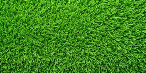 A close-up texture of lush, vibrant green artificial grass, showcasing the intricate details of the blades and the overall density of the surface.