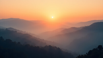 Hazy Sunset Over Rolling Mountain Ridges