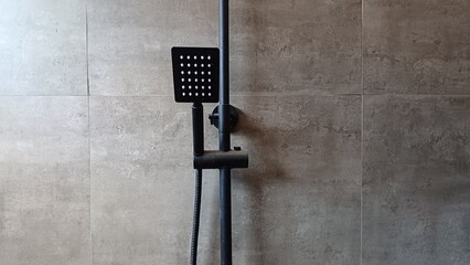 black shower rail, bathroom shower with natural stone square tiles