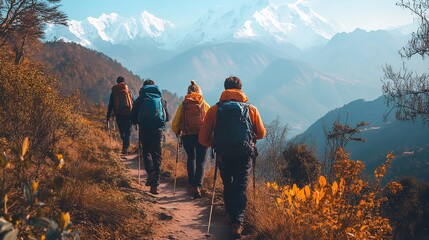 Fototapeta premium Hikers on a Mountain Trail with a Stunning View