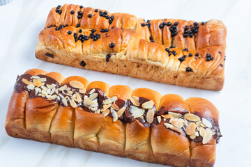 Pastry with chocolate butter and banana filling. perfect for recipe, article, catalogue, or any commercial purposes. with copy space.