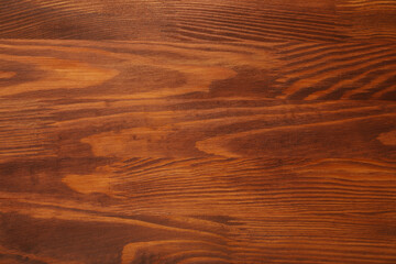 Obraz premium Applying walnut wood stain. Texture of wooden surface as background, top view