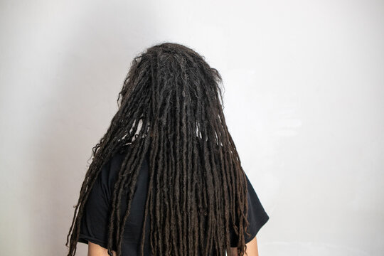 Rear view of woman with locs hairstyle