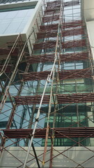 Scaffolding pole arrangement in a renovation project in an office building
