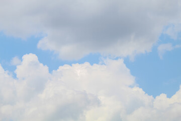 The sky was bright blue with pure white clouds like soft cotton. Full frame shot. Cloudly sky blue...