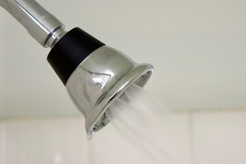 metal shower head in the bathroom