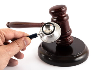 Stethoscope head and judge's gavel