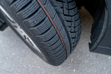 car vehicle tire showing full tread pattern