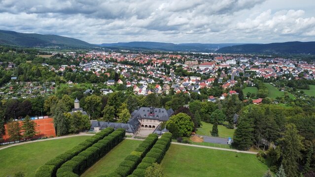 Scenic aerial view of Bergfried mansion in Saalfeld and residential area in Germany