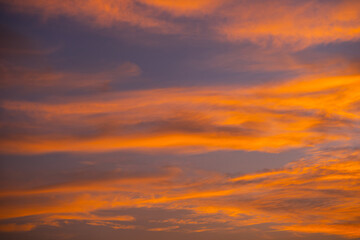 Enjoy a panoramic view of the skyline. The sun rises in the morning sky with colorful clouds. and beautiful cloud patterns In the soft light of the morning
