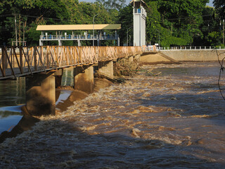 Debris from the violent flash floods stuck to the bridge.