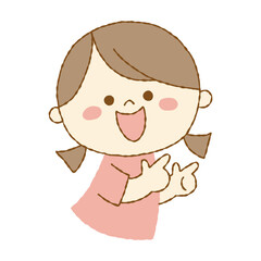 Obraz premium 両手で指さしをする笑顔の女の子