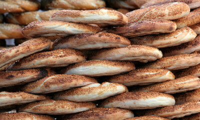 Fototapeta premium Close up of The Turkish Sesame Bagel aka Simit for sale at Farmers market in Adana, Turkey