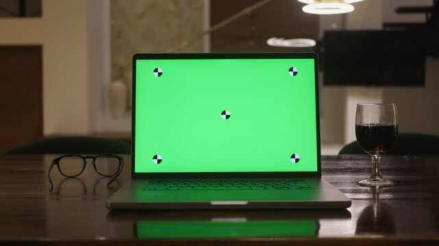 Laptop displaying green chroma key screen versatility of green screen technology for creators and professionals. Chroma key technology laptop with green screen principles of chroma key technology.