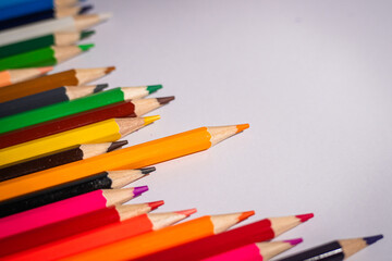A row of pencils with one pencil standing out