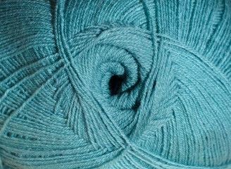 Turquoise wool close-up. Skein of yarn, close-up.