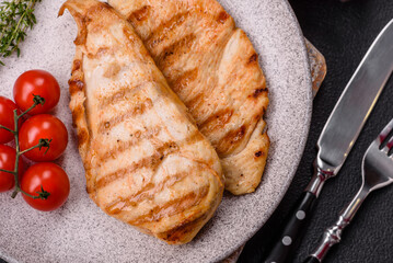 Delicious fresh grilled chicken fillet with spices and herbs