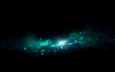 Obraz premium A glowing blue and green light streaks across a dark, starry background.