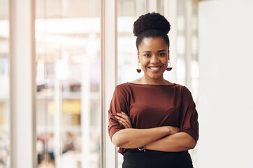 Black woman, portrait and arms crossed in office, worker and proud project manager in Kenya. Female...