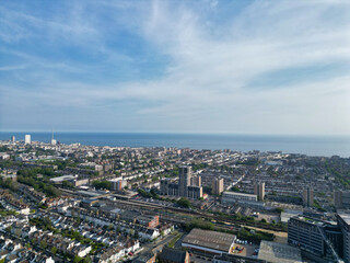 Obraz premium High Angle View of Most Beautiful and Attractive British Tourist Attraction of Brighton seaside resort and Beach City of East Sussex, England GB. Footage Captured with Drone's Camera on May 9th, 2024