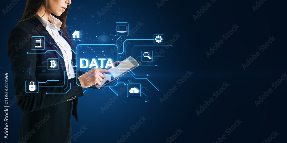 Aufkleber Headless young businesswoman using tablet with glowing data hologram on blue background with mock up place. Big data, Application programming interface concept.