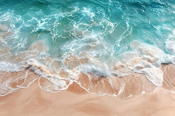 
Aerial view of beautiful sandy beach with turquoise water and waves, top down perspective. Beautiful seascape background for banner design. View from drone above the ocean at sunny day.