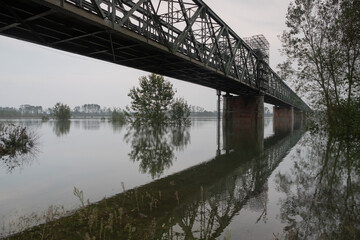 GPS INSIDE Flood River Po Ticino Bridge Becca water banks trees boats harbor panorama nature landscape