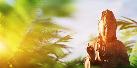 Close-up of buddha statue hand in meditative pose