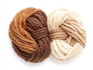 Close up of brown and cream yarn balls.