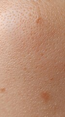 Fototapeta premium The photograph captures a detailed view of men's skin, emphasizing its texture and appearance, showcasing the importance of effective body care