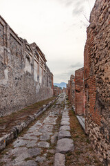 Street in Pompeii receding into perspective. Evening lighting.